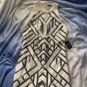 Traje corto en lentejuelas